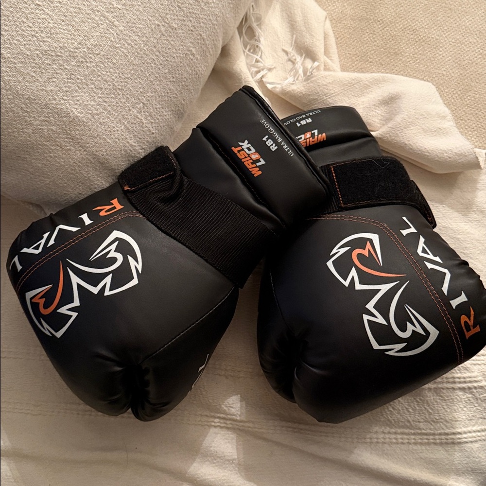 Black Boxing Gloves with Orange and White Accents